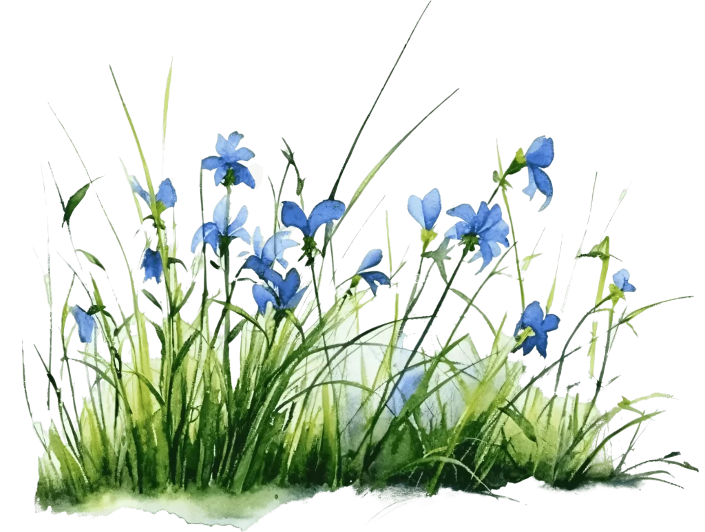 Bright blue flowers with wild green grass sprouting out of the ground.